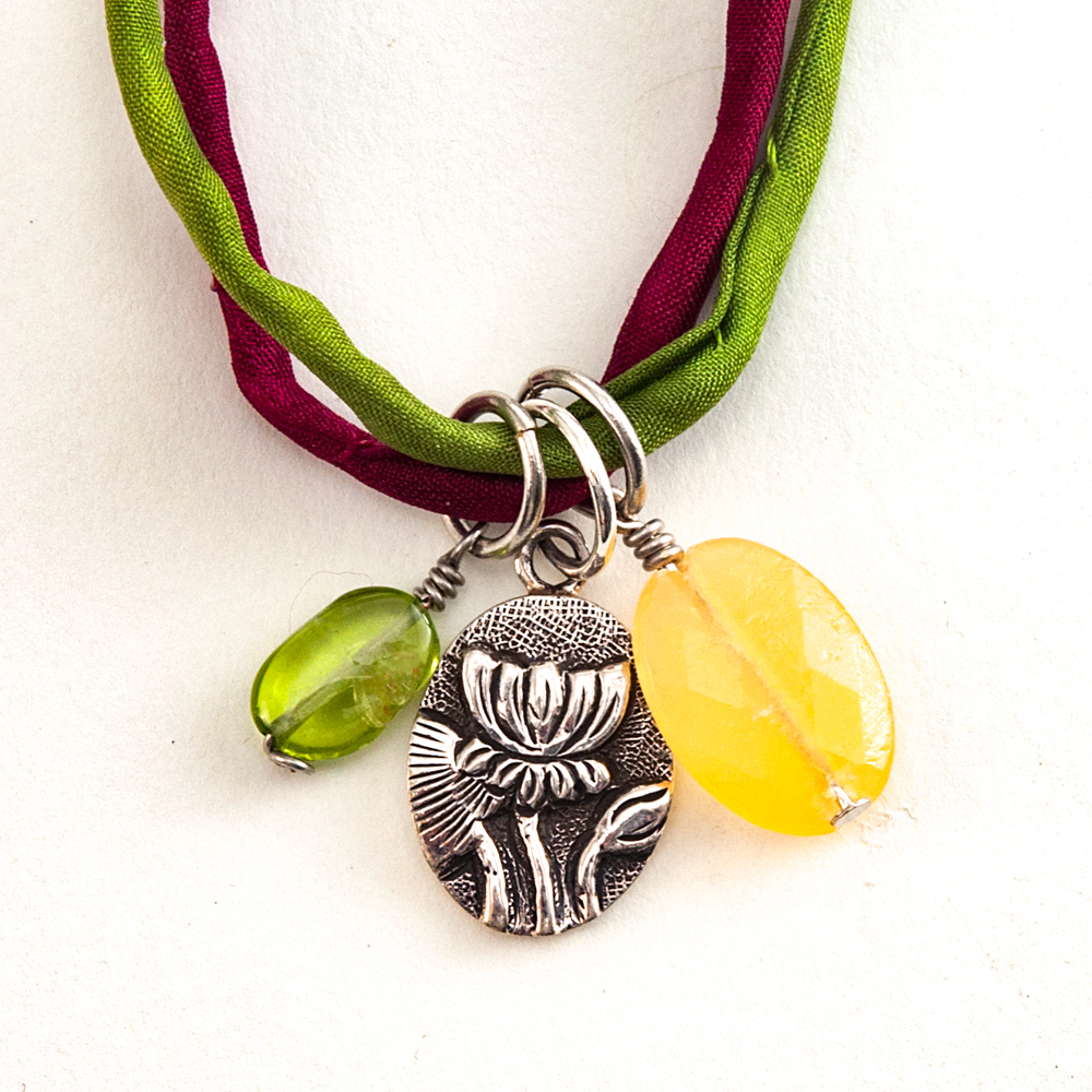 pendants on silk cord
